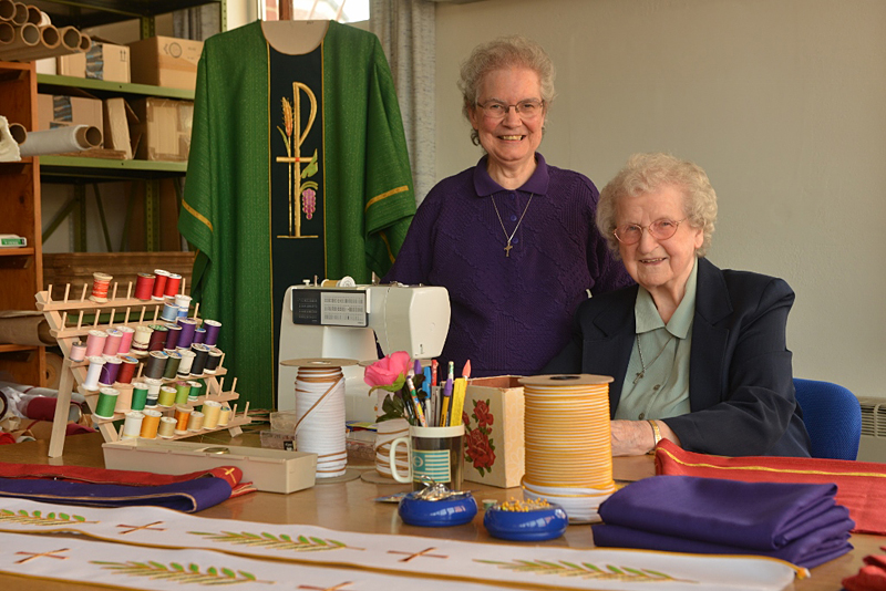 Precious Blood Sisters Viola Marie Spire (left), 82, and Ann Hipp, 95, sew altar cloths and vestments in their community’s Ecclesiastical Art Department. Sister Ann is featured on the 2015 Retirement Fund for Religious campaign materials.